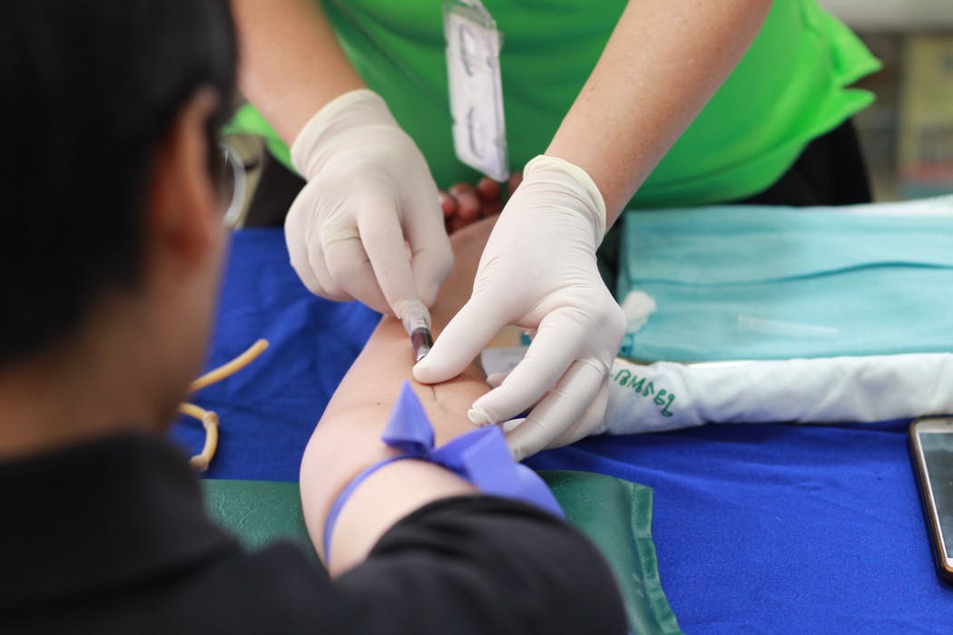 getting blood sample from a patient